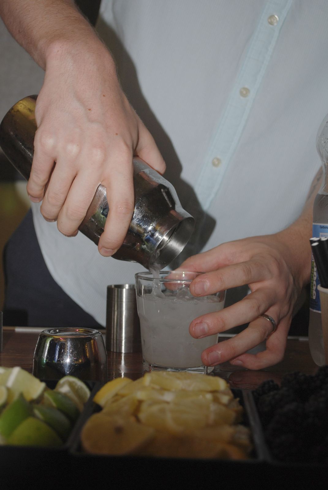 Bartender pouring a zero-proof cocktail