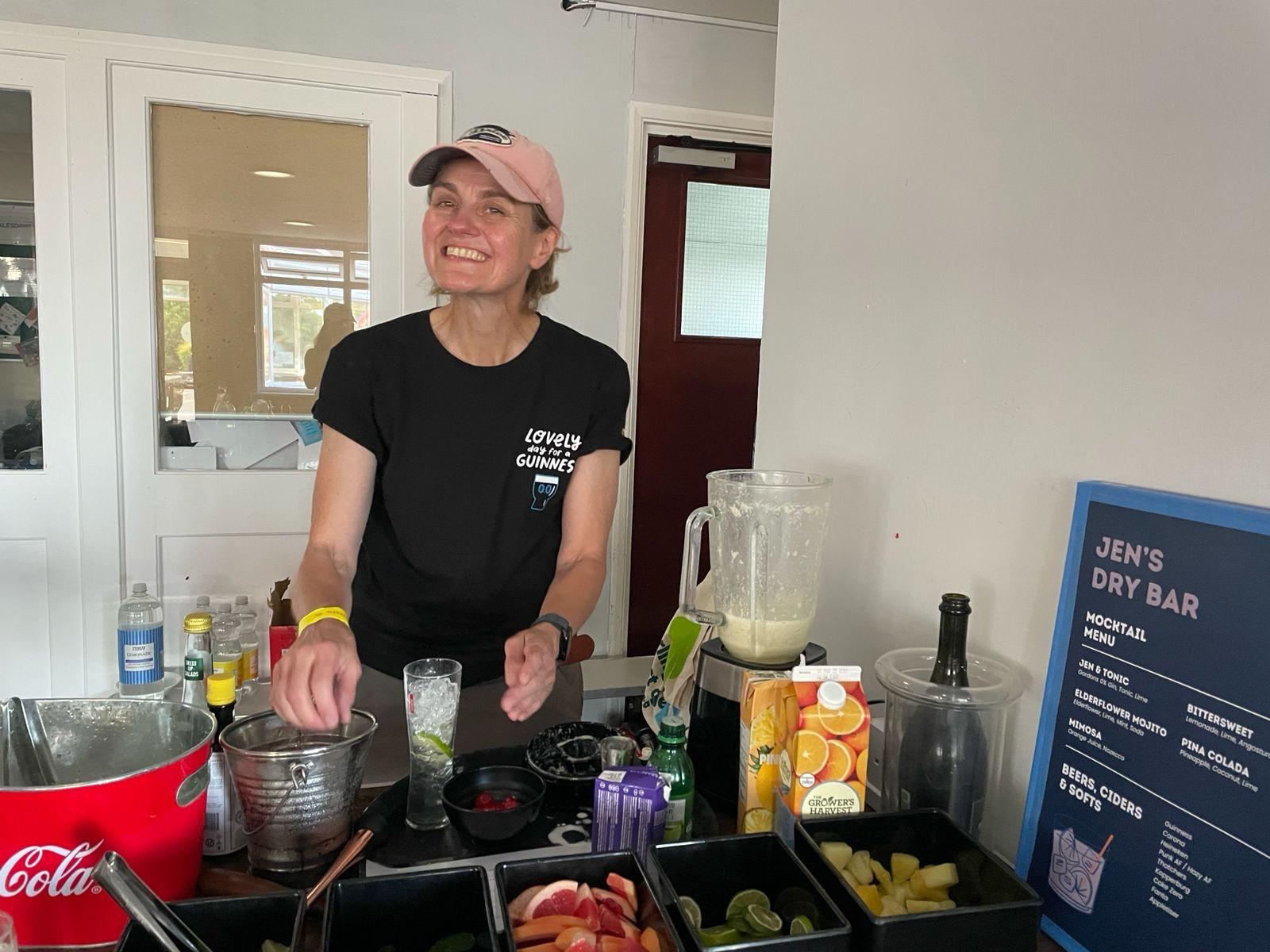 Eremos bartender behind the bar